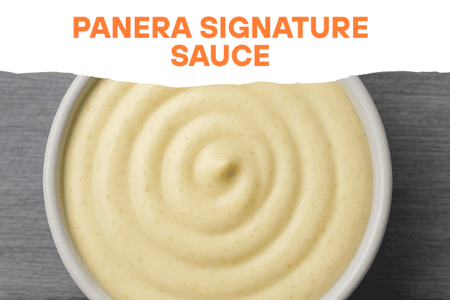 Panera Signature Sauce in a bowl with a smooth, creamy swirl on top, featuring bold text at the top reading 'PANERA SIGNATURE SAUCE'.