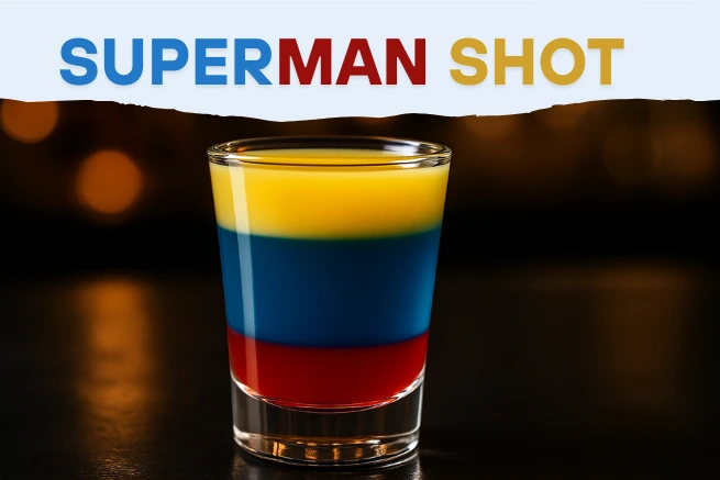 Superman Shot drink with colorful red, blue, and yellow layers, labeled with bold "SUPERMAN SHOT" text above the glass.